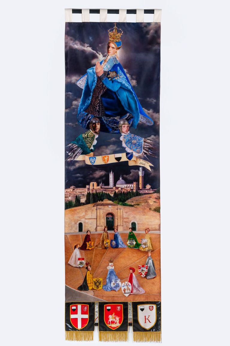 Palio di Siena. Dove inizia l’arte e finisce la regola: è polemica per il drappellone. La risposta della Chiesa: Il Comune guidi di più l’artista